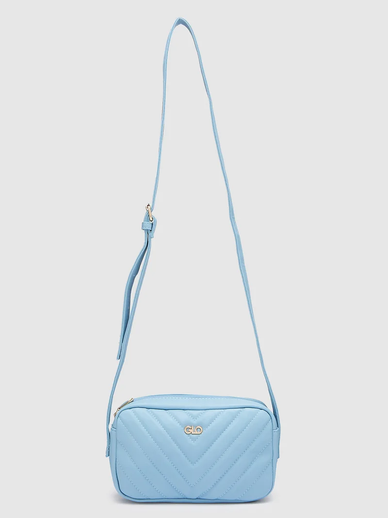 جلو باص حقيبة كروس بودي نسائية بلون أزرق جليدي بنقوش بارزة